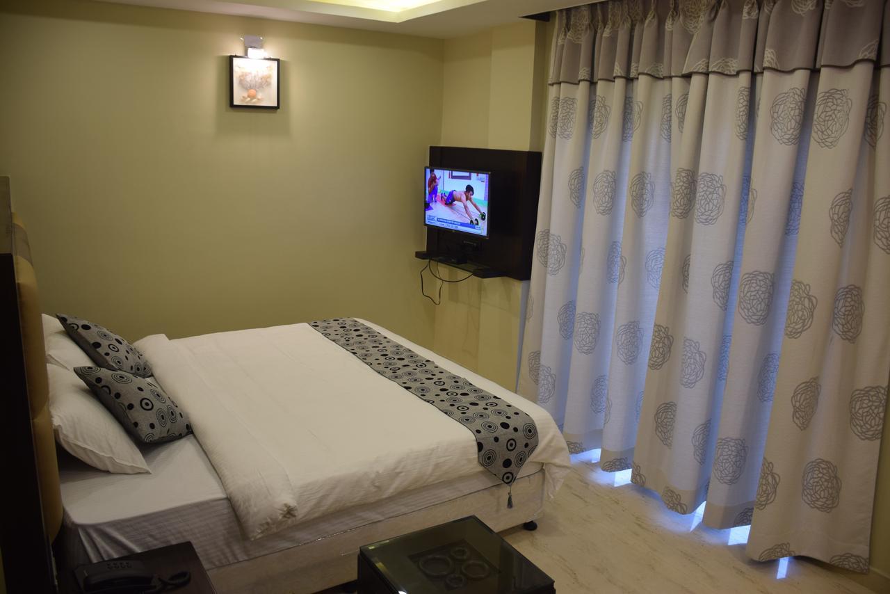 Golden Tree Hotel Puri Bagian luar foto