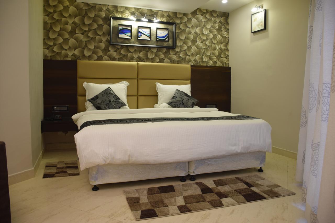 Golden Tree Hotel Puri Bagian luar foto